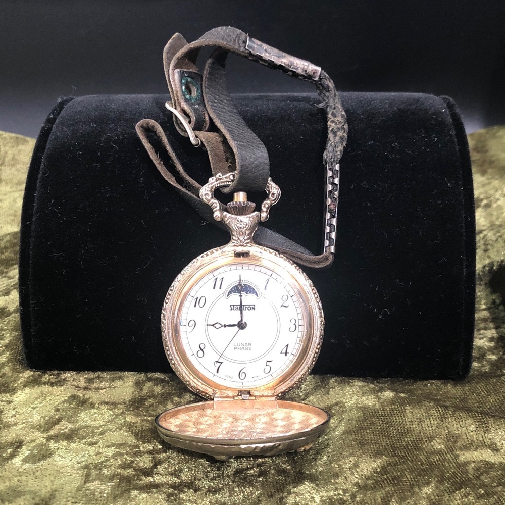 Silver-Tone Pocket Watch with Black Leather Strap man fishing